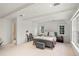 Light and airy bedroom with high ceilings, built-in shelving, and ample natural light at 1991 E Alameda Ave # 14, Denver, CO 80209