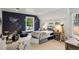 Bright bedroom with large window, designer paint and trim, carpeted floors, and an open, airy feel at 1991 E Alameda Ave # 14, Denver, CO 80209