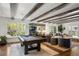 Spacious game room with exposed beams, a pool table, comfortable seating, and plenty of natural light at 1991 E Alameda Ave # 14, Denver, CO 80209