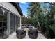 Enjoy this outdoor seating area with adjacent water feature and mature landscaping at 1991 E Alameda Ave # 14, Denver, CO 80209
