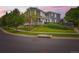 Elegant home exterior with charming front porch and lush landscaping at 3597 Xanthia St, Denver, CO 80238