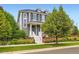 Beautiful two-story home featuring manicured landscaping and classic architectural details at 3597 Xanthia St, Denver, CO 80238