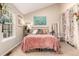 Cozy bedroom featuring a comfortable bed, natural light, and inviting decor at 4636 S Dillon Ct # B, Aurora, CO 80015