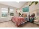 Bright bedroom with large windows, vaulted ceilings, and stylish decor at 4636 S Dillon Ct # B, Aurora, CO 80015