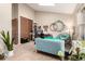 Relaxing space with a sofa, large windows, and high ceilings at 4636 S Dillon Ct # B, Aurora, CO 80015