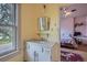 Bathroom with window and view of bedroom at 835 Niagara St, Denver, CO 80220