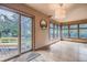 Bright dining room featuring hardwood floors, big windows offering lots of natural light, and a walk-out to the deck at 835 Niagara St, Denver, CO 80220