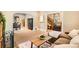Open-concept living area with an inviting layout, neutral tones, and seamless flow to adjacent spaces at 835 Niagara St, Denver, CO 80220