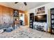 Inviting living area that features a TV, neutral rug, and wood accents at 4942 W 9Th Ave, Denver, CO 80204