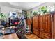 This home office features lots of natural light and is large enough to accommodate a large wardrobe and desk at 4942 W 9Th Ave, Denver, CO 80204