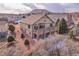 Exterior of home with a two-tiered deck and a well-manicured backyard at 1339 Bent Grass Cir, Castle Rock, CO 80109