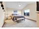 Bright bedroom with vaulted ceiling, ceiling fan, large window, and king-size bed at 1339 Bent Grass Cir, Castle Rock, CO 80109