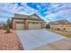 Home with 3-car garage and a xeriscaped front yard and large driveway at 1339 Bent Grass Cir, Castle Rock, CO 80109
