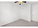 Bedroom features carpet, a fan light fixture, and a closet for storage at 18129 E 99 Pl, Commerce City, CO 80022