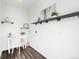 Bright office space featuring modern shelving and decor at 18129 E 99 Pl, Commerce City, CO 80022