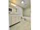 Updated bathroom with tile flooring, modern vanity, and a shower-tub combination at 1243 Gaylord St # 302, Denver, CO 80206