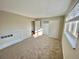 Spacious bedroom with carpet, window, and large closet with sliding doors at 1243 Gaylord St # 302, Denver, CO 80206