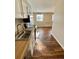 Well-maintained kitchen flows seamlessly into a living area with hardwood floors and natural light at 1243 Gaylord St # 302, Denver, CO 80206
