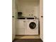Laundry room featuring a washing machine and dryer at 1243 Gaylord St # 302, Denver, CO 80206
