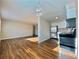 Open layout combines living and kitchen areas with updated flooring and plenty of natural light at 1243 Gaylord St # 302, Denver, CO 80206