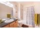 Bathroom featuring a shower-tub combination and a vanity with sink at 3100 Blue Sky Cir # 205, Erie, CO 80516