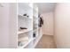 Walk-in closet providing ample shelving and storage space for an organized wardrobe at 3100 Blue Sky Cir # 205, Erie, CO 80516