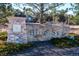 Stone community sign reads 'Blue Sky' in a landscaped setting at 3100 Blue Sky Cir # 205, Erie, CO 80516