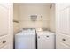 Convenient laundry room equipped with a full-size washer and dryer at 3100 Blue Sky Cir # 205, Erie, CO 80516