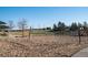 Sandy community volleyball court ready for a match, with a green gazebo in the background at 3100 Blue Sky Cir # 205, Erie, CO 80516