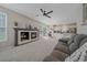 Open-concept living room flows seamlessly into a modern kitchen and dining area, perfect for entertaining at 3860 Mallard Dr, Highlands Ranch, CO 80126