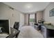 Comfortable home office with a large desk, and a leather chair at 3860 Mallard Dr, Highlands Ranch, CO 80126