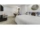 Cozy bedroom features neutral carpet, closet, and decor at 6857 Timbers Drive, Evergreen, CO 80439