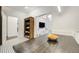 Dining area with sliding doors and view to living room, features a large wood table at 6857 Timbers Drive, Evergreen, CO 80439