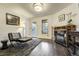 Inviting living room with a cozy fireplace and stylish decor creates a warm and comfortable atmosphere at 6857 Timbers Drive, Evergreen, CO 80439
