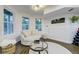 Cozy sitting area with plush seating and lots of light at 6857 Timbers Drive, Evergreen, CO 80439