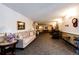 Comfortable lobby area with seating, decor, and a warm, welcoming ambiance at 13890 E Marina Dr # 107, Aurora, CO 80014