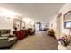 Elegant lobby with plush seating, ornate mirrors, and a classic, inviting atmosphere at 13890 E Marina Dr # 107, Aurora, CO 80014