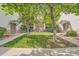 Charming townhome entrances with stone accents, landscaped grounds, and well-maintained walkways at 3262 E 103Rd Dr # 1810, Thornton, CO 80229
