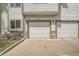 Attached two car garage with side by side bays and concrete driveway at 3262 E 103Rd Dr # 1810, Thornton, CO 80229