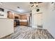 A functional kitchen featuring stainless steel appliances and wood cabinets with ample storage at 3262 E 103Rd Dr # 1810, Thornton, CO 80229