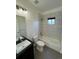 Well-lit bathroom with shower, tile floor, and modern fixtures at 3440 W 33Rd Ave, Denver, CO 80211