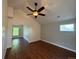 Bedroom with hardwood floors, ceiling fan, and natural light at 3440 W 33Rd Ave, Denver, CO 80211
