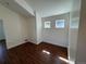 Bright bedroom with hardwood floors, two windows and neutral walls, offering a cozy atmosphere at 3440 W 33Rd Ave, Denver, CO 80211
