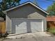Exterior of two-car garage with white door at 3440 W 33Rd Ave, Denver, CO 80211