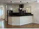 Well-designed kitchen with pendant lighting, stainless appliances, and a breakfast bar for casual dining at 3440 W 33Rd Ave, Denver, CO 80211