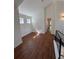 Living room with hardwood floors, many windows, and light walls, creating a bright and airy ambiance at 3440 W 33Rd Ave, Denver, CO 80211