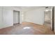 Bright bedroom with neutral carpet, standard closet, and white walls at 12108 Melody Dr # 103, Denver, CO 80234