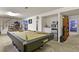 Finished basement with a pool table, kitchenette and recreation area at 5030 Titan Ct, Denver, CO 80239
