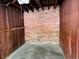 Exposed basement area with unfinished walls, brickwork and concrete floor at 1416 N Downing St # 1, Denver, CO 80218