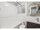 Updated bathroom with modern sink, white tile, and updated fixtures at 1416 N Downing St # 1, Denver, CO 80218